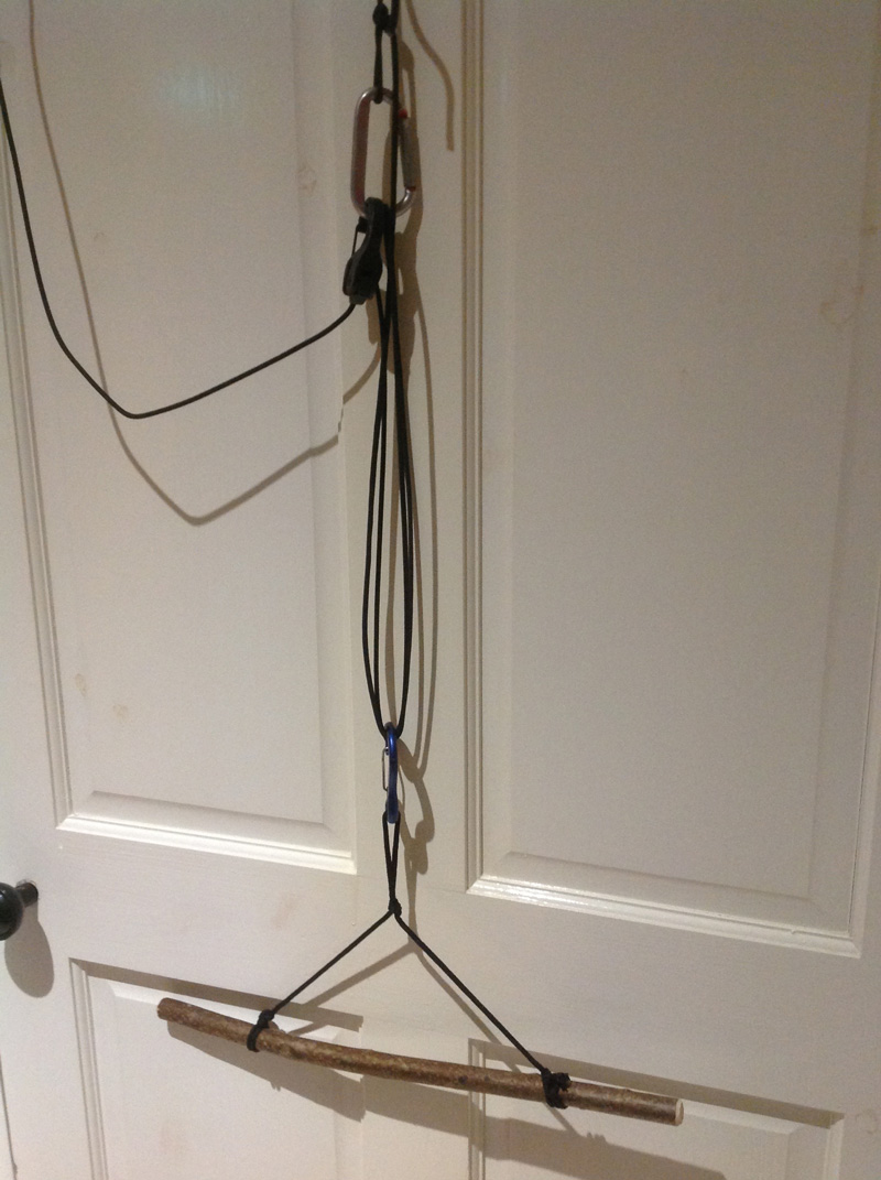 Pulley system using ropes and a stick